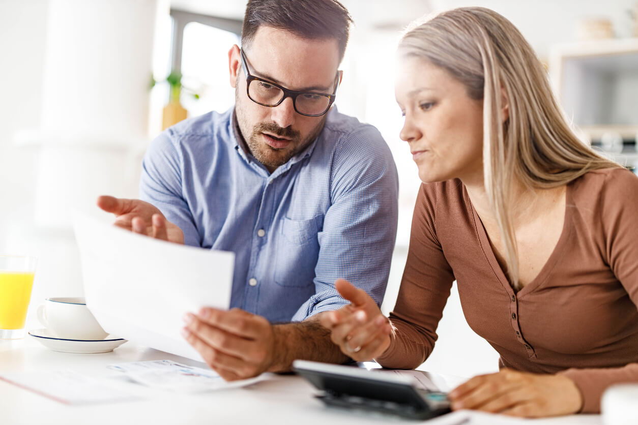 Young couple looking at paperwork